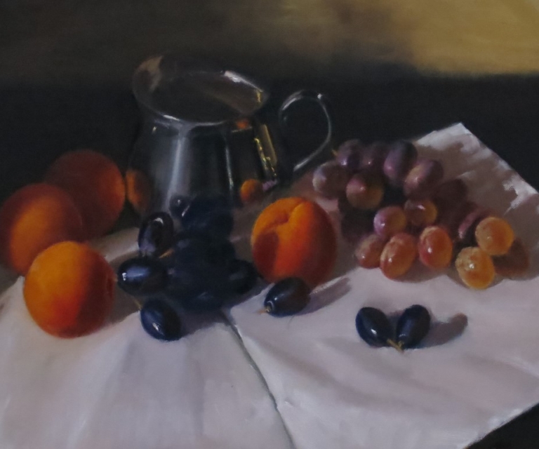 Silver jug with fruit